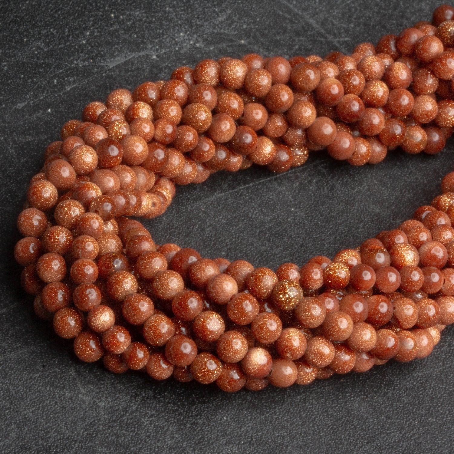 4mm Goldstone Plain Rounds 14 inch 85 beads