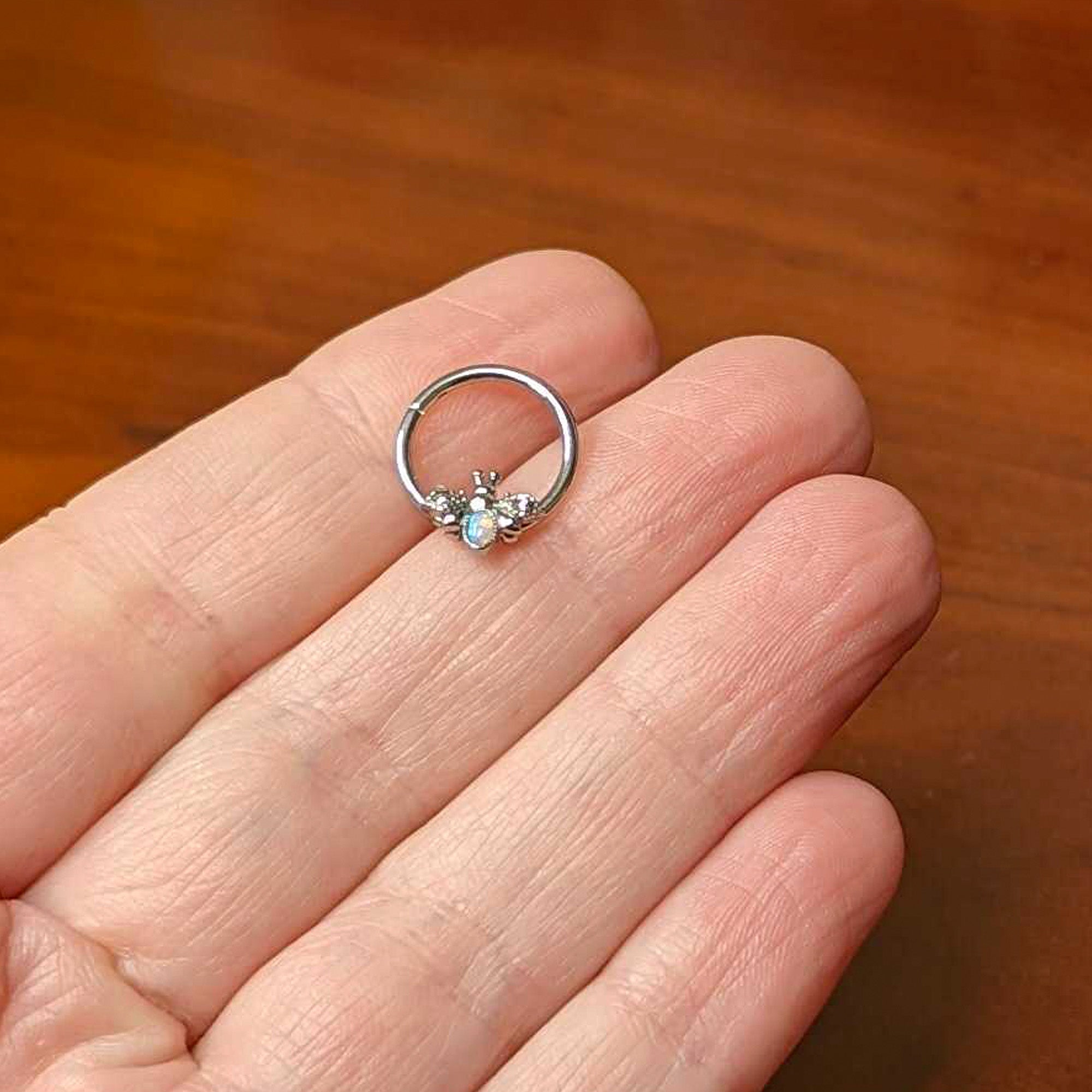 16G 3/8 White Synthetic Opal Insect Hinged Segment Ring
