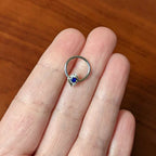 16G 3/8 Clear Blue Gem Oval Swirl Hinged Segment Ring