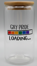 Clear glass tumbler with 'Gay Pride Loading' text and rainbow flag on a white background