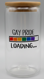 Clear glass tumbler with 'Gay Pride Loading' text and rainbow flag on a white background