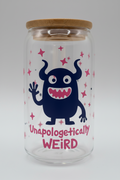clear glass with cartoon monster and unapologetically weird decal